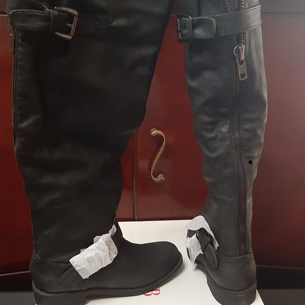 Women's zip up knee high boots